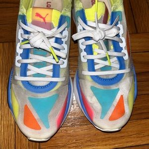 Multi colored mesh Puma sneakers. In great condition! Worn a handful of times.